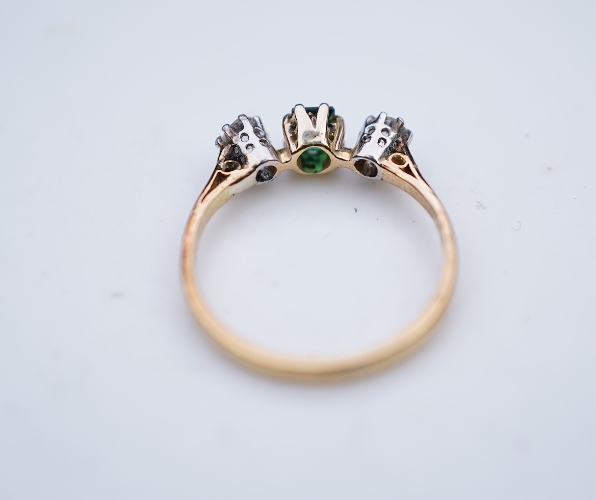 A tsavorite and diamond ring